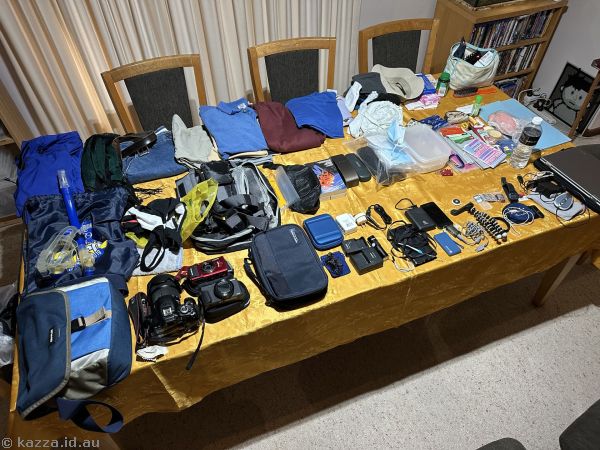 All my packing for the trip spread out on the dining room table