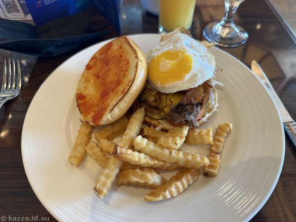 Voyage Burger<br>Hashed-brown potatoes, bacon, house-made pickle, fried egg, sharp cheddar, tomato relish<br>From the Seaday Brunch menu