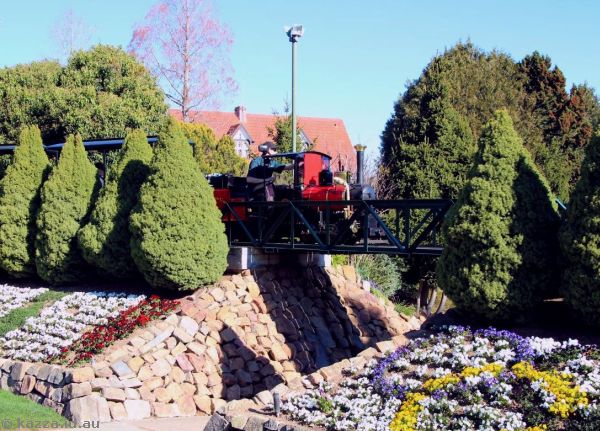 2016 - Mini train crossing the bridge at Cockington Green
