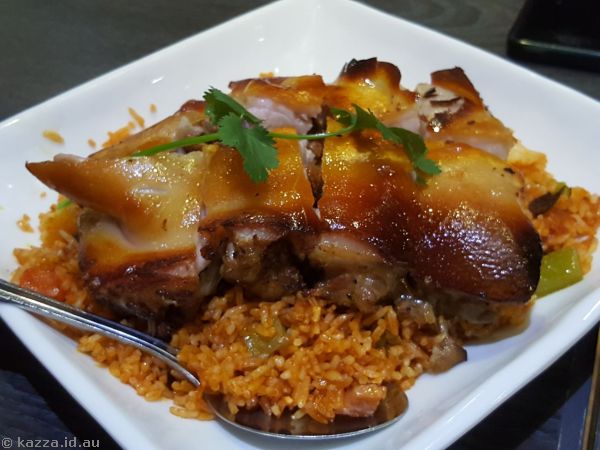 Baked Stuffed Suckling Pig w/Rice Portuguese Style at Corto Portuguese Restaurant