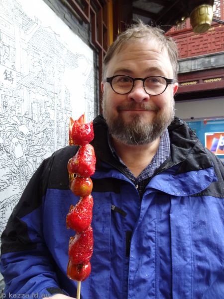 Stu with fruit on a stick at Yu Garden