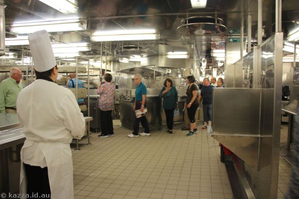 It was a long conga line of people walking in single file through the galley