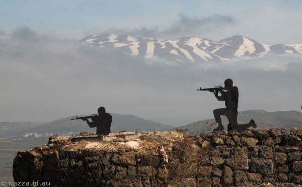 Soldier iron cutouts on Mt Bental with Mt Hermon ranges in the background