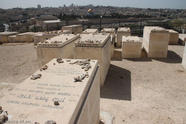 Graves in the cemetery (rocks on top are from relatives paying their respects)