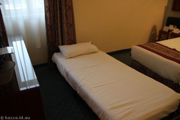 My bed at the Mount Zion Hotel