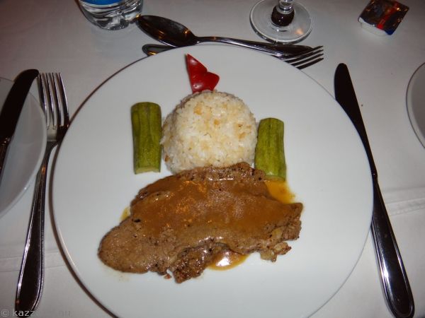 Beef steak - grilled beef steak meat in brown sauce, served with rice and sautéed vegetable