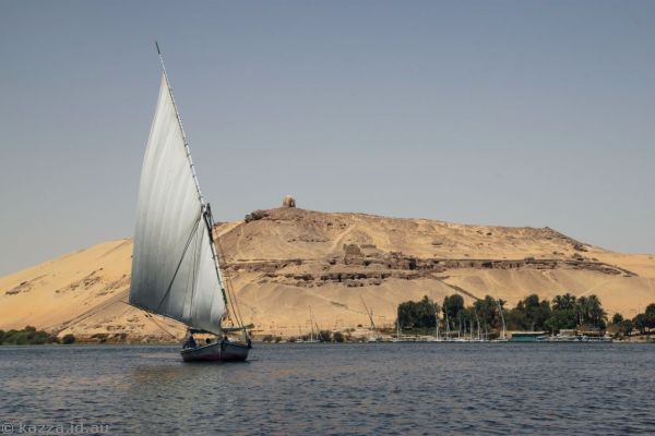Felucca on the Nile with the Tombs of the Nobles