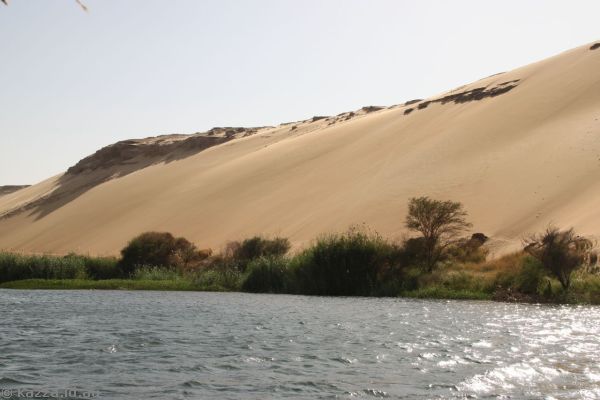 Sand dune from the Sahara Desert butting up against the Nile River