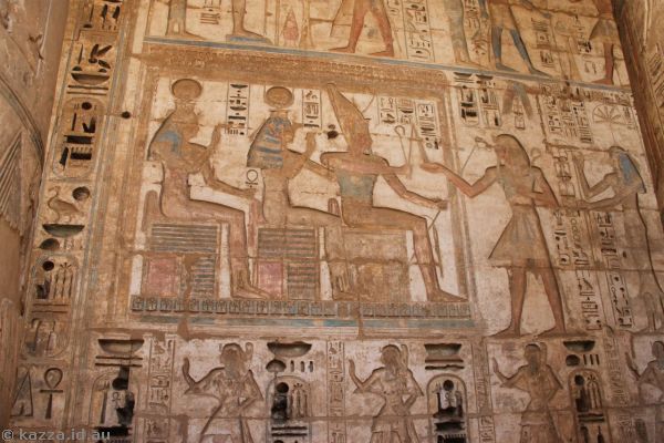 Stone carvings on the walls at Habu Temple