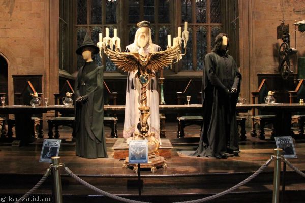 Minerva McGonagall, Albus Dumbledore and Severus Snape costumes at the teacher's table in the Great Hall