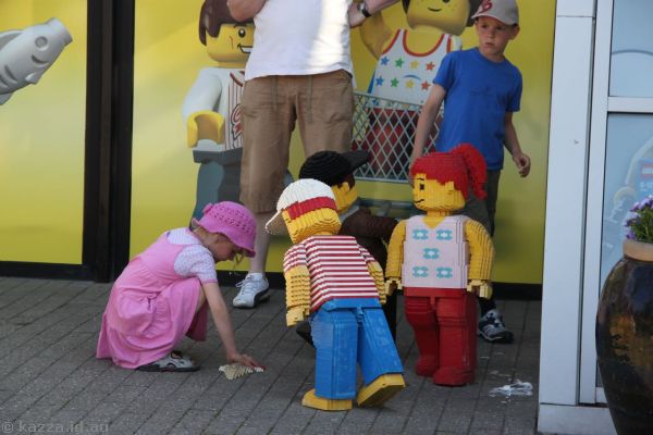 Kid with Lego minifigs