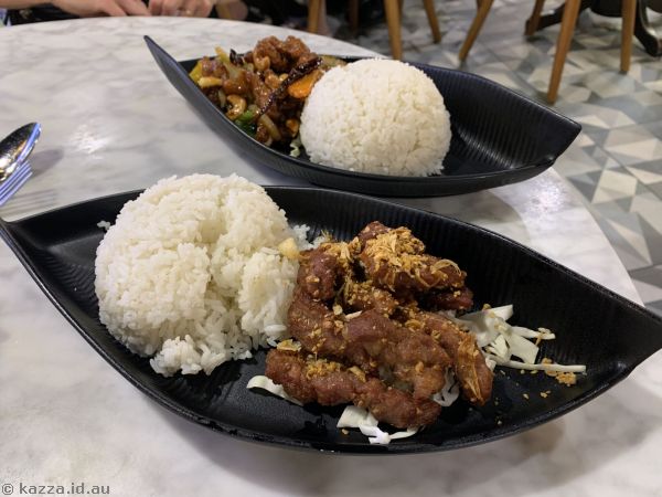 Cashew chicken (rear) and garlic pork (front) which we shared for dinner
