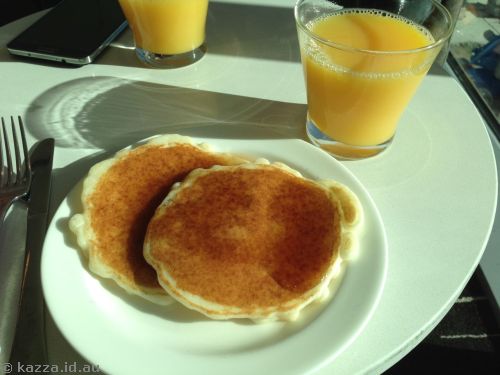 Pancakes and juice in the Qantas club