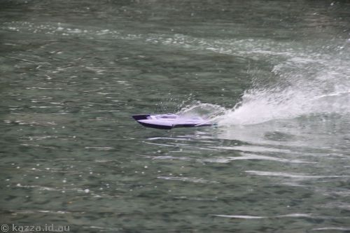 Model boat zipping around the pond in Victoria Park