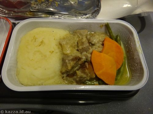 Dinner on the plane - slow braised pork with cider cream sauce, mashed potatoes and green beans