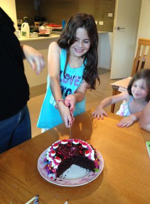 Lily cutting her cake (again)