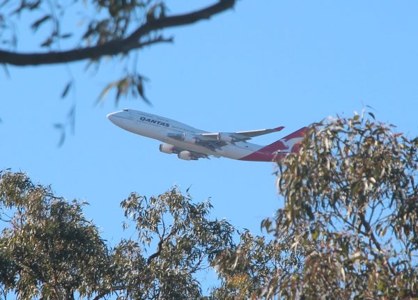 VH-OEJ rounding Mt Ainslie
