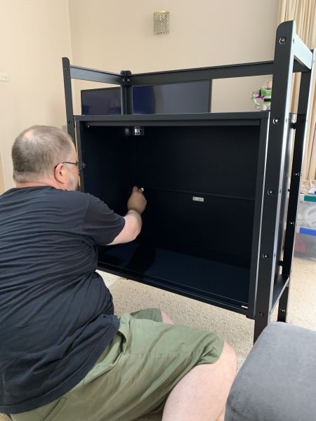 Stu building his shelves