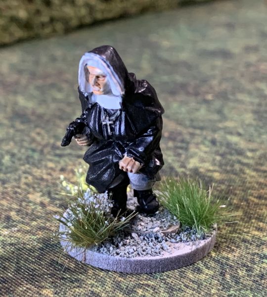 Nun with gun