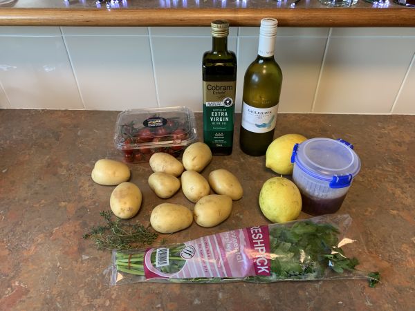 Potatoes with lemon and tomatoes