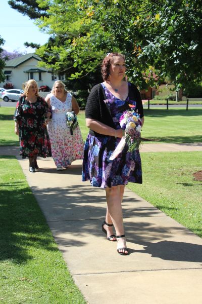 The bridal party arriving