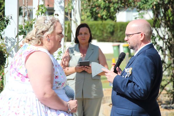 Ben reading his vows