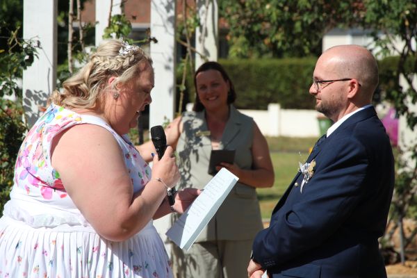 Sarah reading her vows