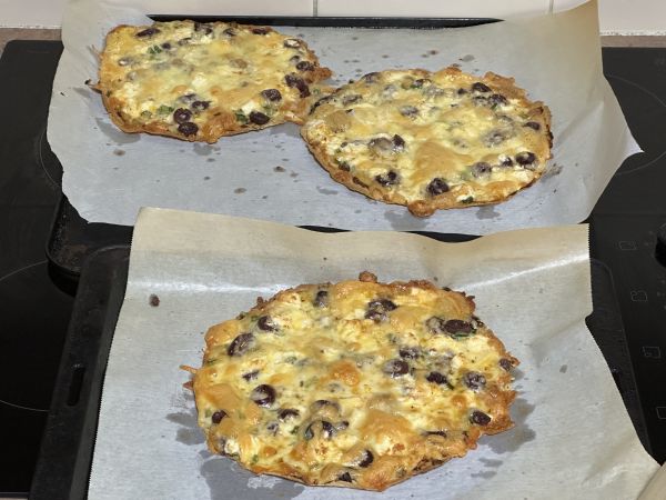 Olive and feta pizzas