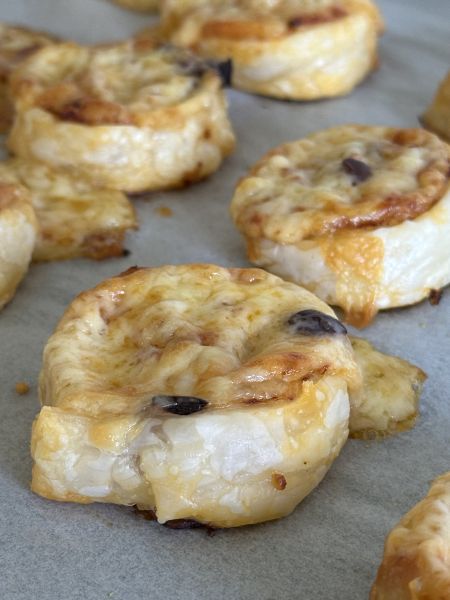 Pepperoni and olive pizza scrolls