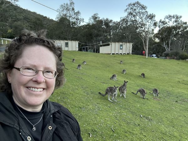 Me with kangaroos at Reflections Burrinjuck