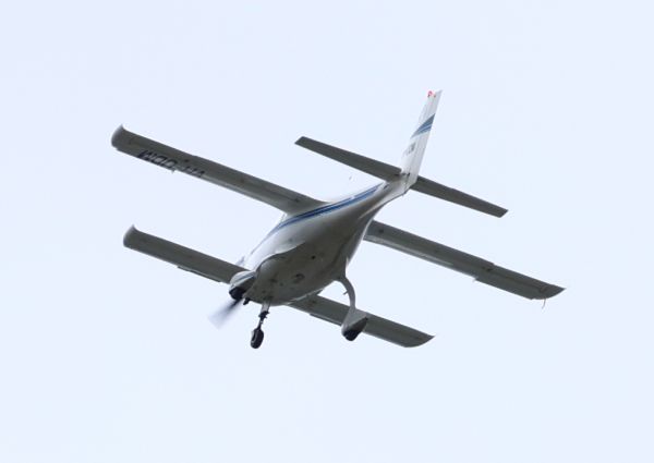 VH-UDM over Canberra