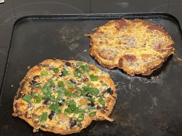 Olive and pepperoni pizzas