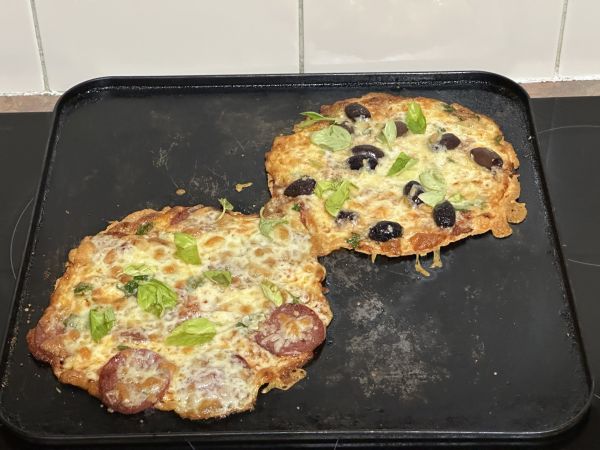 Olive pizza and pepperoni pizza