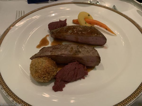 Clementine and spice glazed duck, duck confit croquette, red cabbage puree, root vegetables, jus, that I had for mains (I couldn't finish it)