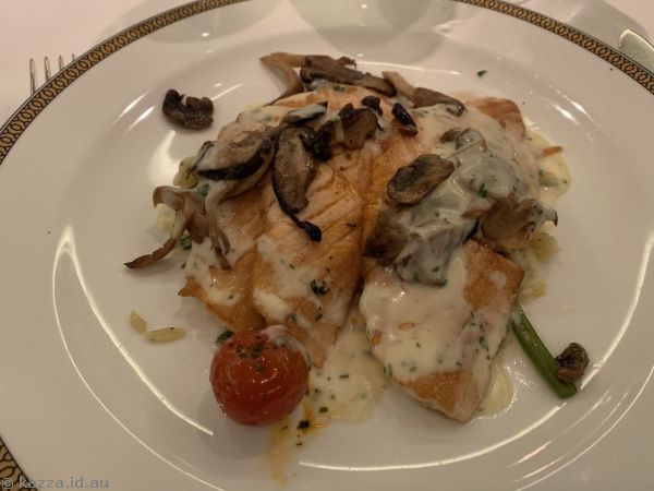 Pan-seared salmon scaloppini, roasted almond and haricot vert orzo, roasted shitake mushrooms, cherry tomate etuvee from the a la carte menu that I had for dinner