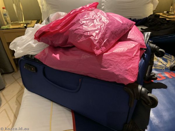 My overflowing suitcase I wasn't sure how I was going to close!