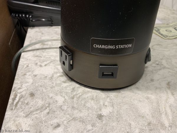 Very civilised charging station next to the bed