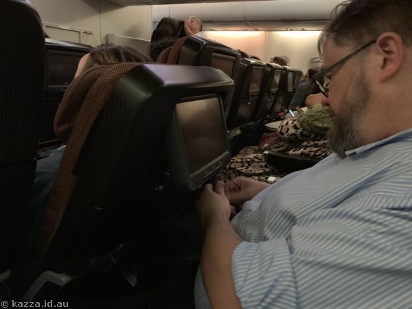 The poor sweetie had no room at all the *entire* flight