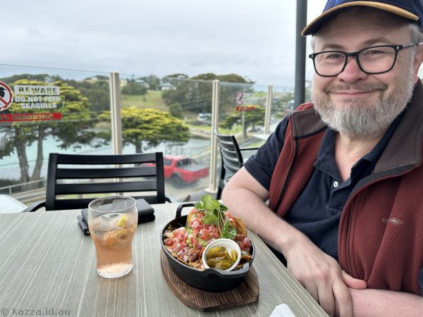 Stu with his nachos that he had for lunch at the Narooma Hotel