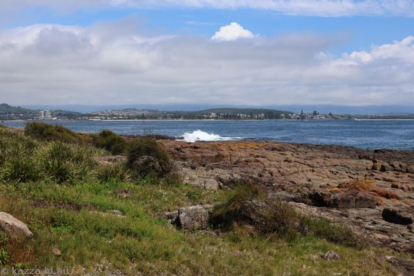 Waves crashing over rocks at Bass Point