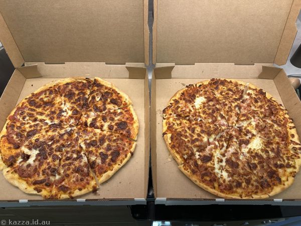 Pepperoni ($26) and aussie ($26) pizzas we got from Zia's in Kiama