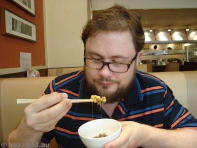 Stu eating natto in Denny's
