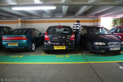 Itty bitty parking spots in a parking station in Windsor