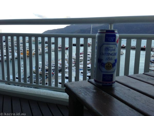 Enjoying a beer on the balcony of our hotel in Cairns