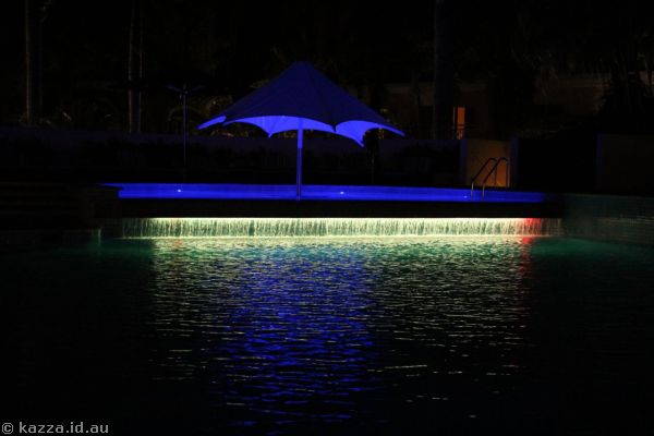 Fountain in the pool by night