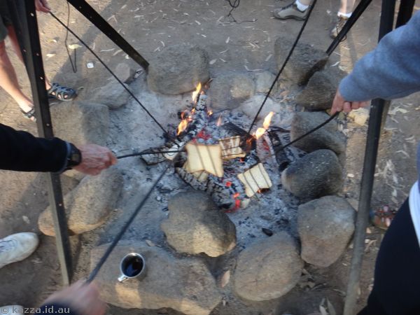 Cooking toast over the coals