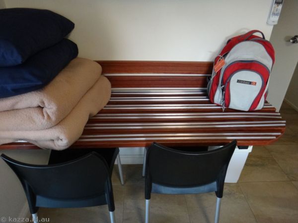 The only horizontal surface to use as a desk was turned into a luggage rack