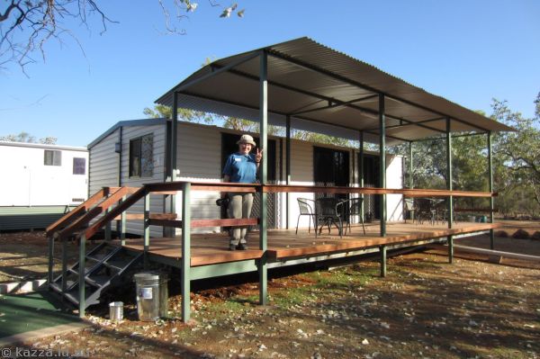 Me in front of our cabin<br>Photo by Mum