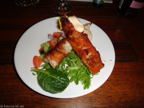 Chicken skewers and salad for entree