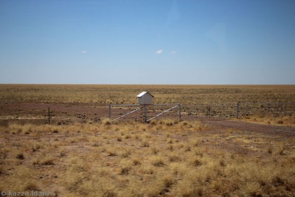 Roadside mailbox and flat landscape